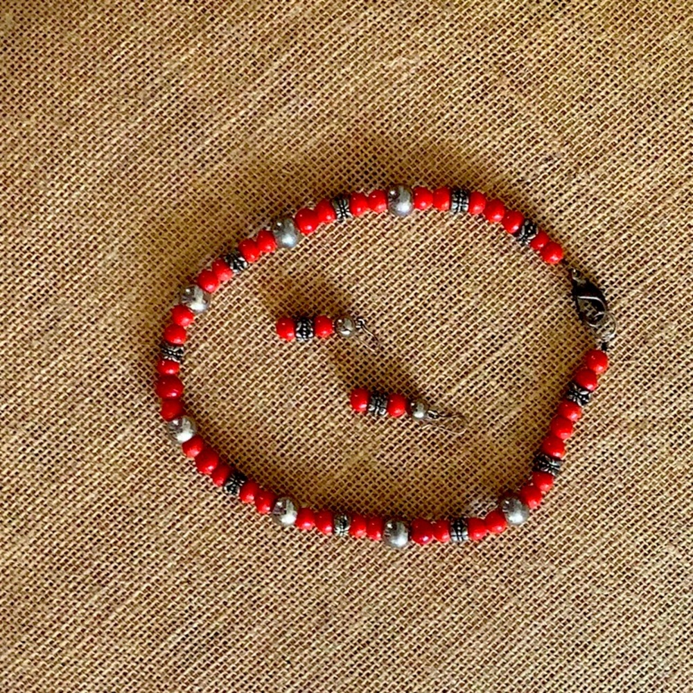 Red and silver bead necklace with matching earrings